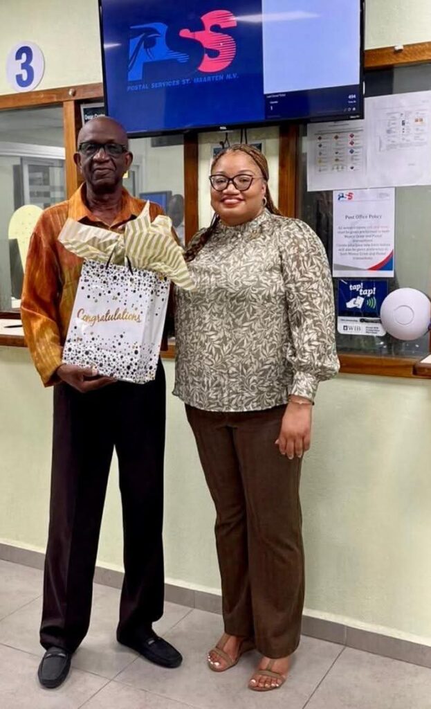 Finance Minister Gumbs Pays Tribute to Cedric Kirindongo on His 35 Years at Postal Services St. Maarten N.V.